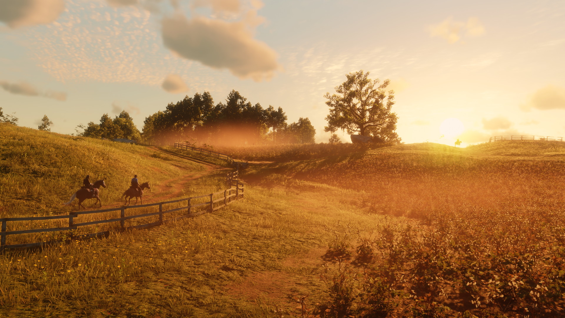 Red Dead Redemption 2 screenshot: two riders crossing open farmland at sunset