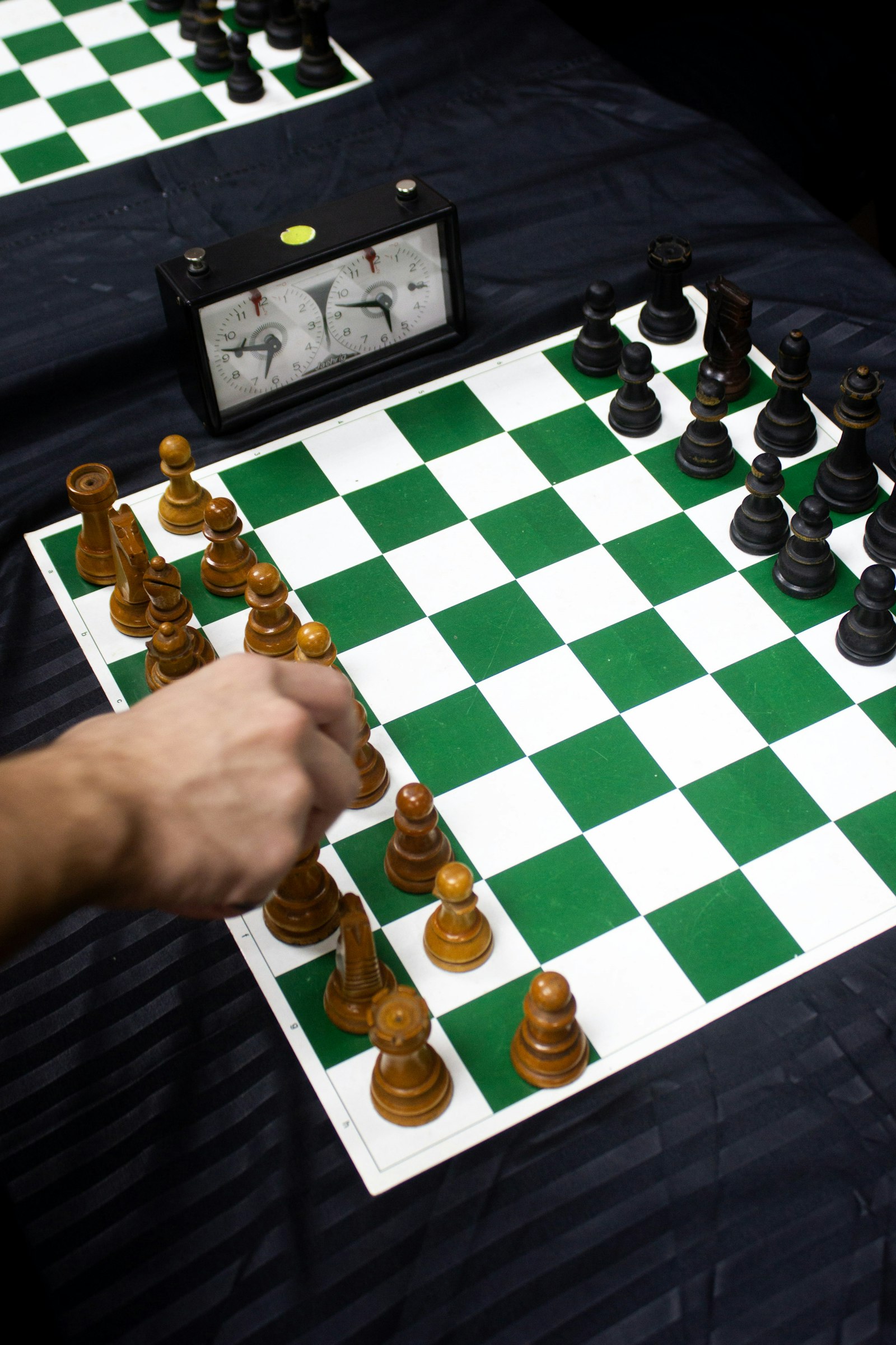 A chess game in progress with a timer beside the board