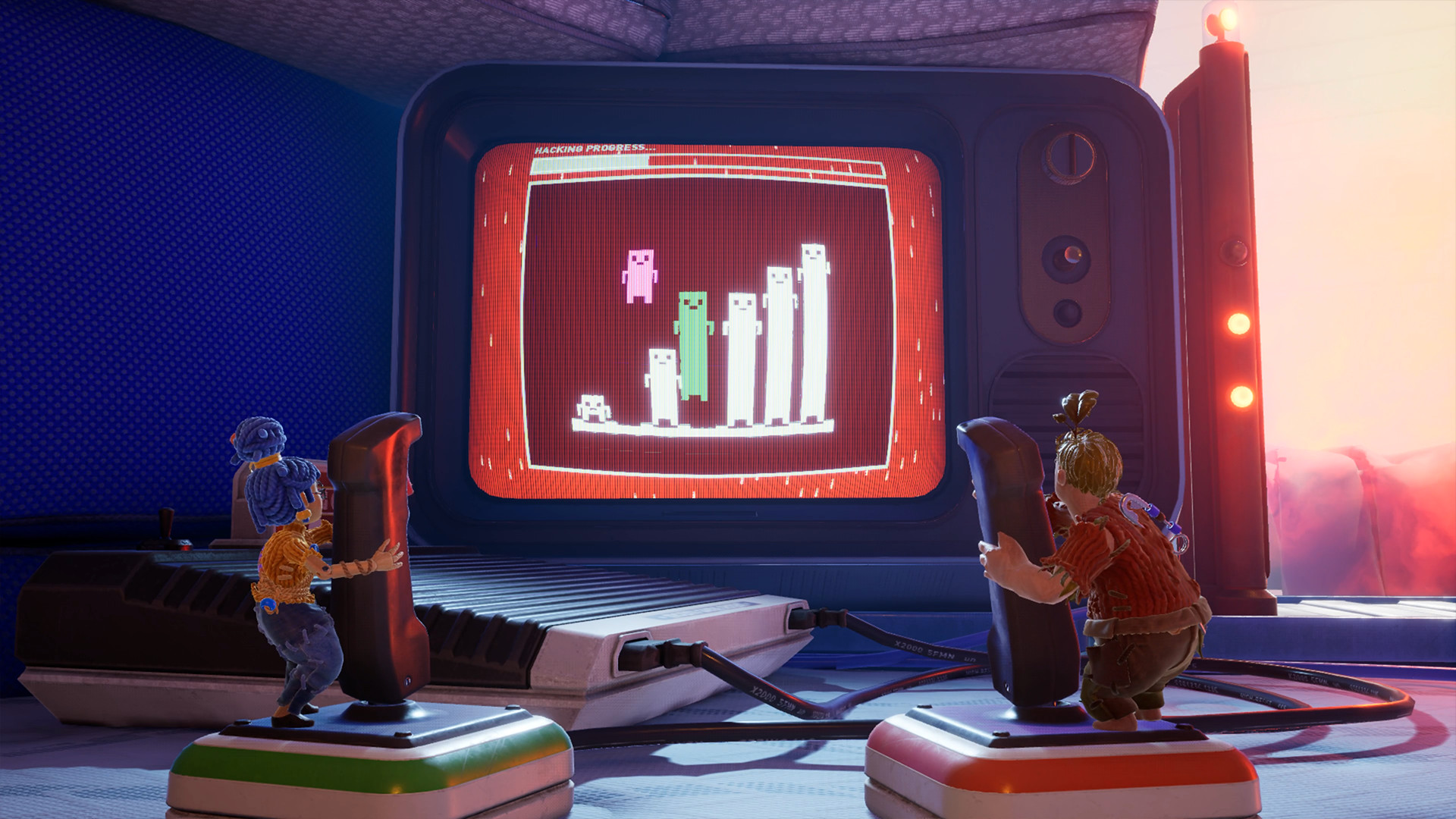 It Takes Two screenshot: Cody and May, shrunk to doll size, working a pair of giant joysticks