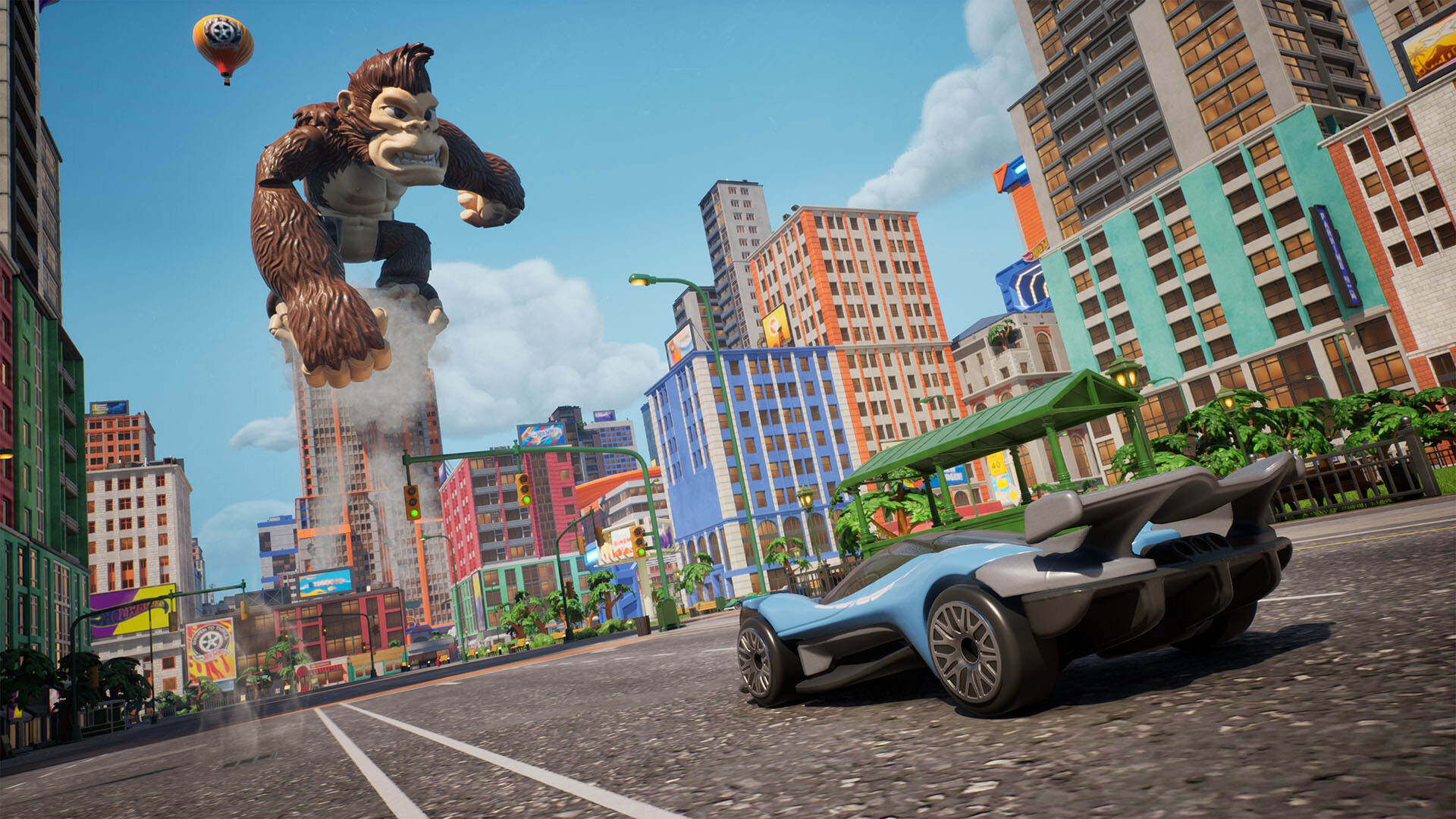 Hot Wheels Infinite Rush screenshot: racing through a toy city past a giant gorilla